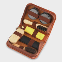 Open leather pouch showing tools inside.