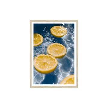 Lemon Float Blu Framed Print