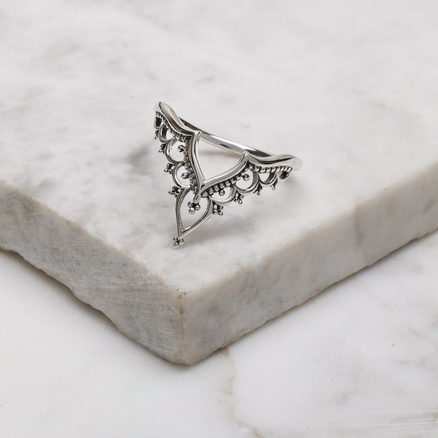 Silver ring with filigree V shape